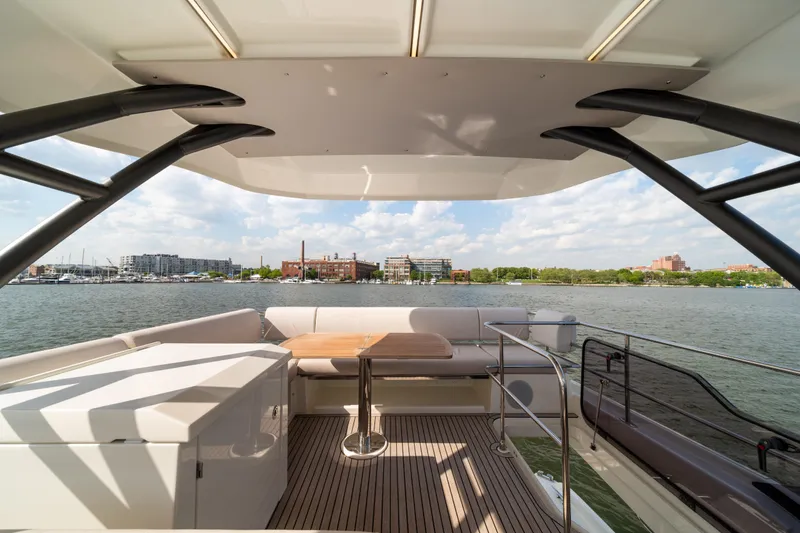 Slide: The Image of Luxurious Prestige F4.9 yacht interior, 2025 model, with waterfront view. - 50