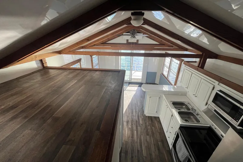 Slide: The Image of Interior of 2017 Catamaran Cruisers Aqualodge with modern kitchen and loft space. - 24