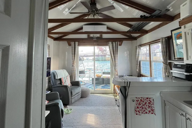 Slide: The Image of Interior of 2017 Catamaran Cruisers Aqualodge with cozy seating and waterfront view. - 7