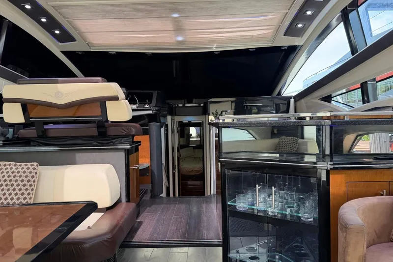 Slide: The Image of Luxurious interior of a 2009 Marquis 500 Sport Coupe yacht with modern furnishings. - 10