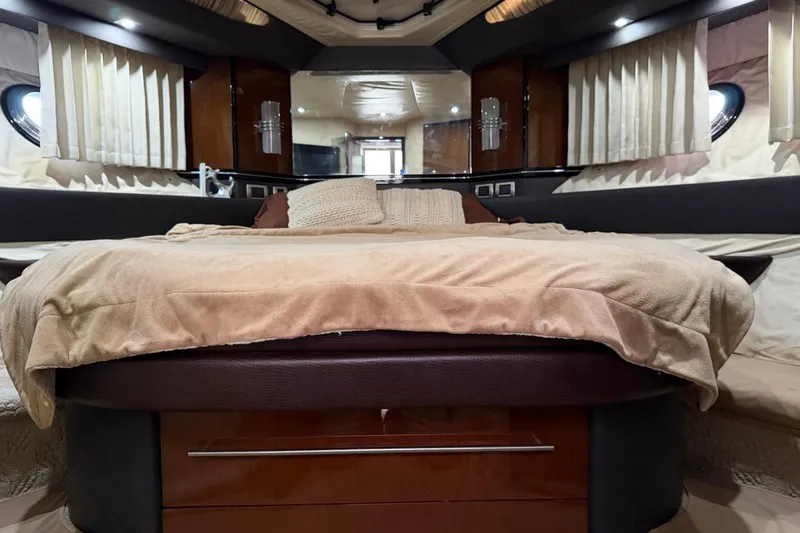 Slide: The Image of Luxurious interior of 2009 Marquis 500 Sport Coupe yacht bedroom. - 26