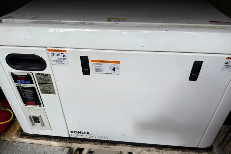 Slide: The Image of ```json { "alt_text": "Kohler power system in 2009 Marquis 500 Sport Coupe." } ``` - 29