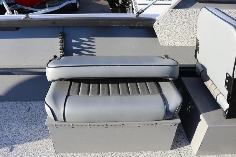 Slide: The Image of 2026 Alumaweld Stryker 220 boat seat with gray upholstery and storage compartment. - 34