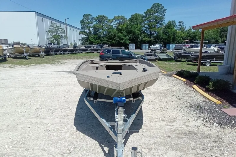 Slide: The Image of 2026 Alweld 1652 Invader boat on trailer in outdoor dealership lot. - 3