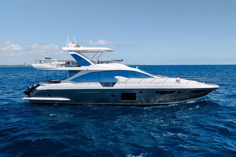 Slide: The Image of 2017 Azimut Fly 72 yacht cruising on open blue sea. - 10