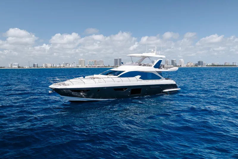 Slide: The Image of Luxurious 2017 Azimut Fly 72 yacht cruising on blue ocean waters. - 13