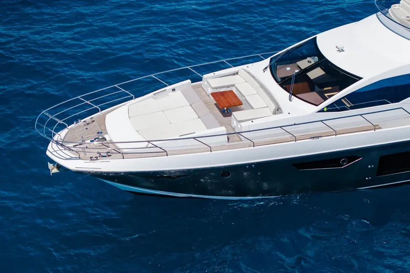 Slide: The Image of Luxurious 2017 Azimut Fly 72 yacht cruising on clear blue waters. - 14