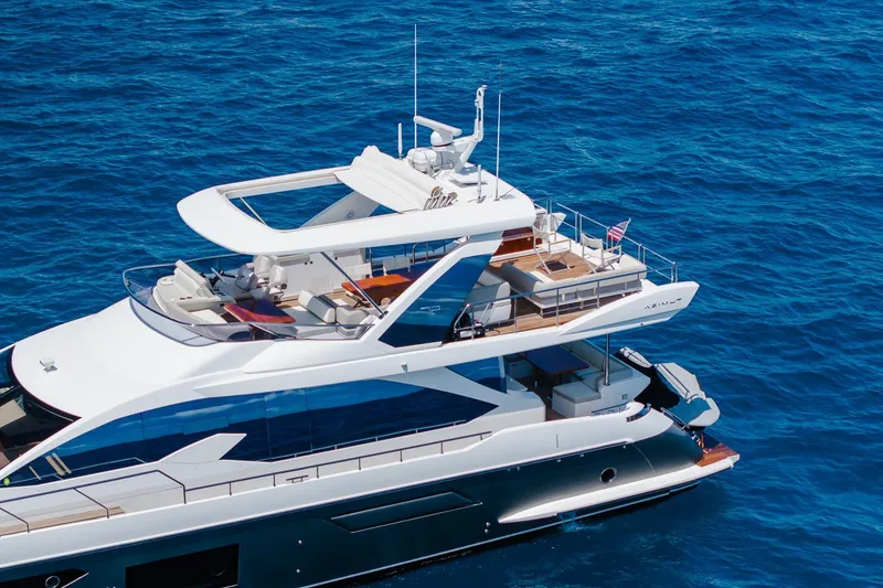Slide: The Image of Luxurious 2017 Azimut Fly 72 yacht cruising on vibrant blue ocean waters. - 15