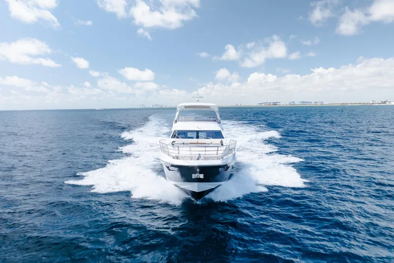 Slide: The Image of Luxurious 2017 Azimut Fly 72 yacht cruising on open sea under clear skies. - 2