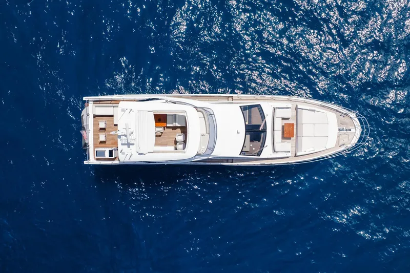 Slide: The Image of Aerial view of 2017 Azimut Fly 72 yacht cruising on deep blue ocean waters. - 20
