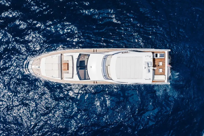 Slide: The Image of Aerial view of 2017 Azimut Fly 72 yacht cruising on deep blue ocean waters. - 24