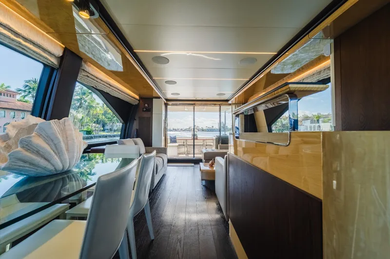 Slide: The Image of Luxurious interior of 2017 Azimut Fly 72 yacht with elegant furnishings and panoramic windows. - 30