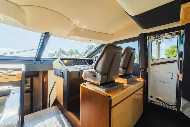 Slide: The Image of Luxurious interior of 2017 Azimut Fly 72 yacht cockpit with modern controls and seating. - 31