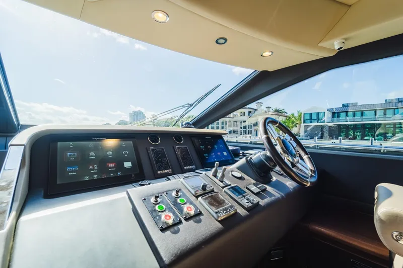 Slide: The Image of Interior view of 2017 Azimut Fly 72 yacht cockpit with modern controls and steering wheel. - 34