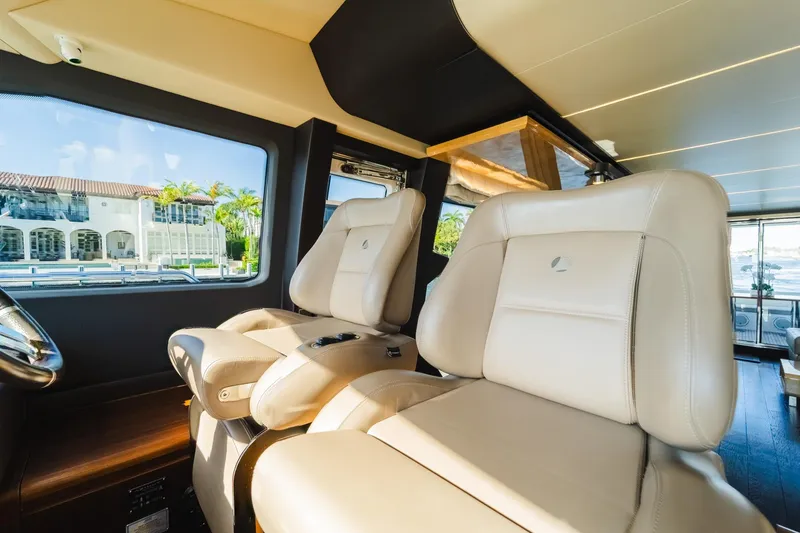 Slide: The Image of Luxurious interior of 2017 Azimut Fly 72 yacht with plush seating and scenic view. - 35