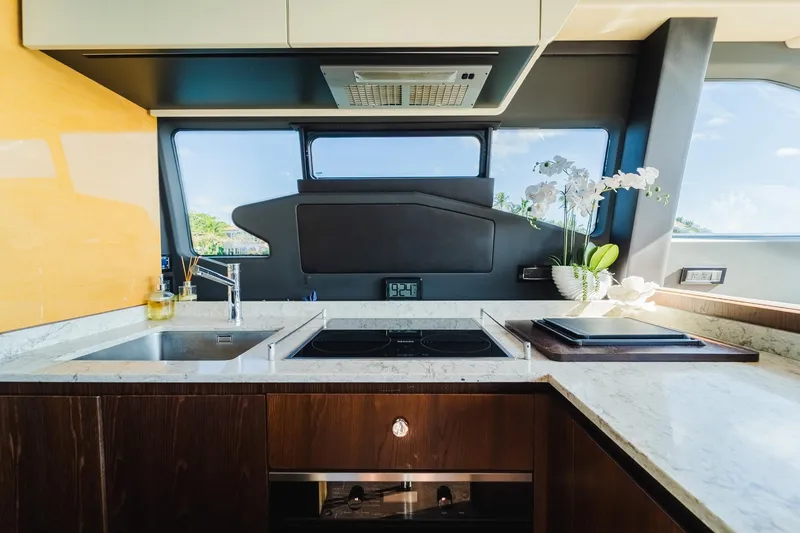 Slide: The Image of Luxurious kitchen interior of 2017 Azimut Fly 72 yacht with modern appliances and elegant design. - 36