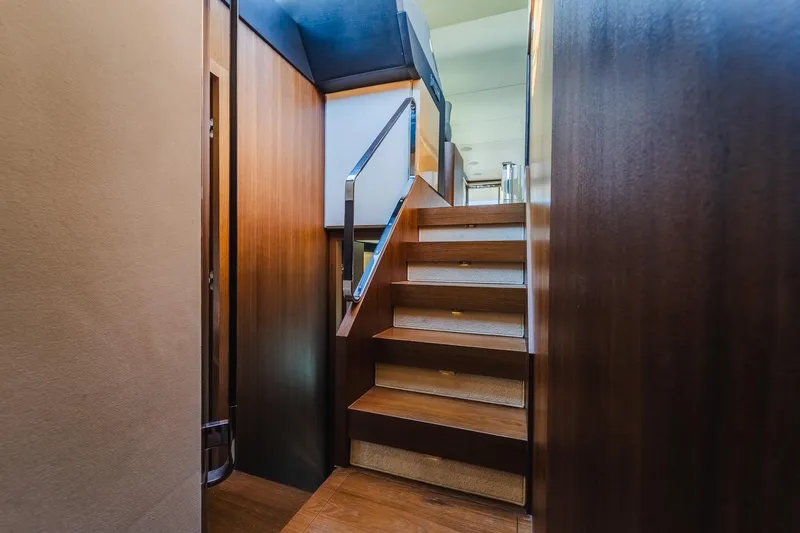 Slide: The Image of Staircase inside 2017 Azimut Fly 72 yacht with sleek wooden finish. - 37