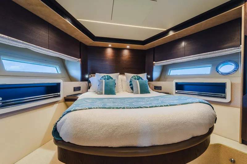 Slide: The Image of Luxurious bedroom interior of 2017 Azimut Fly 72 yacht with elegant bedding and modern design. - 39