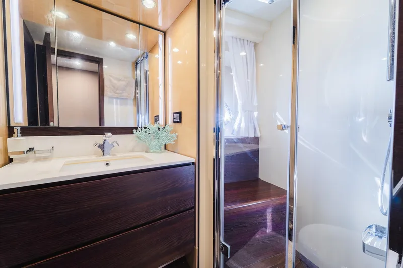 Slide: The Image of Luxurious bathroom interior of 2017 Azimut Fly 72 yacht with modern fixtures and glass shower. - 41