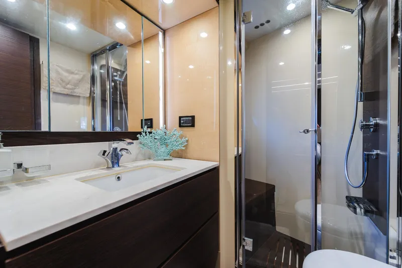 Slide: The Image of Luxurious bathroom in 2017 Azimut Fly 72 yacht with modern fixtures and glass shower. - 44