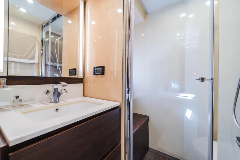 Slide: The Image of Luxurious bathroom interior of 2017 Azimut Fly 72 yacht with modern fixtures and glass shower. - 47