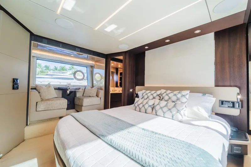 Slide: The Image of Luxurious bedroom interior of 2017 Azimut Fly 72 yacht with elegant decor and large window. - 49