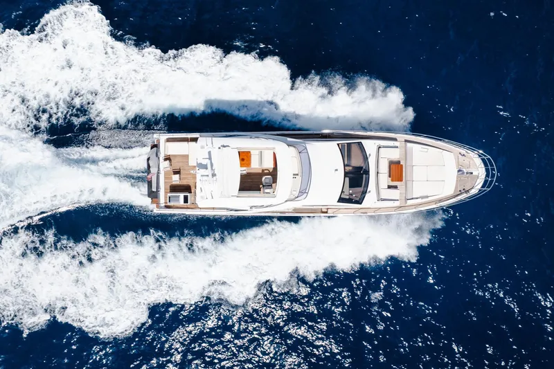 Slide: The Image of Aerial view of 2017 Azimut Fly 72 yacht cruising on blue ocean waters. - 5