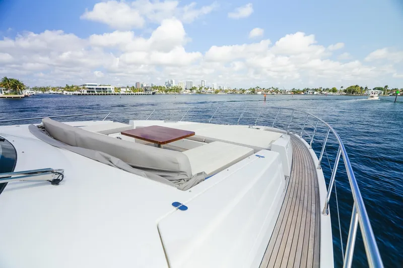 Slide: The Image of Luxurious 2017 Azimut Fly 72 yacht deck with scenic waterfront view. - 59