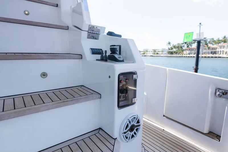 Slide: The Image of Staircase and control panel on 2017 Azimut Fly 72 yacht deck. - 66