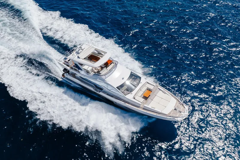 Slide: The Image of Aerial view of 2017 Azimut Fly 72 yacht cruising on open sea. - 8