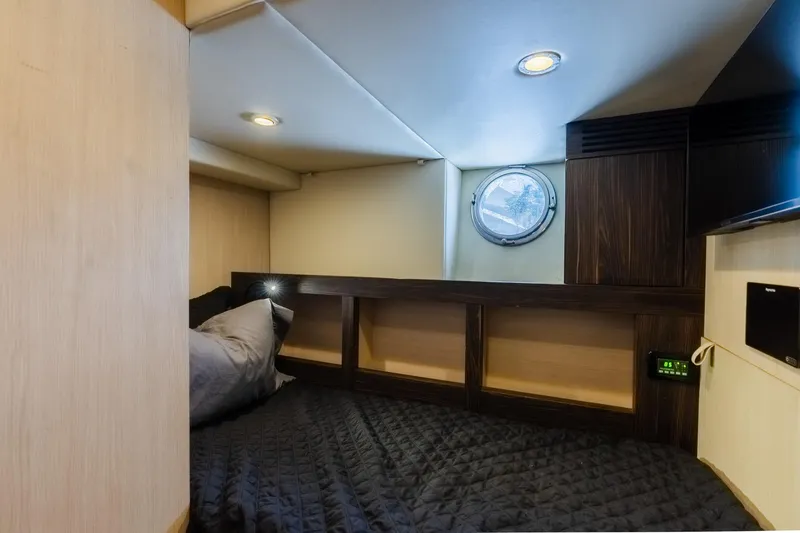 Slide: The Image of Cozy cabin interior of 2017 Azimut Fly 72 yacht with porthole and modern lighting. - 86