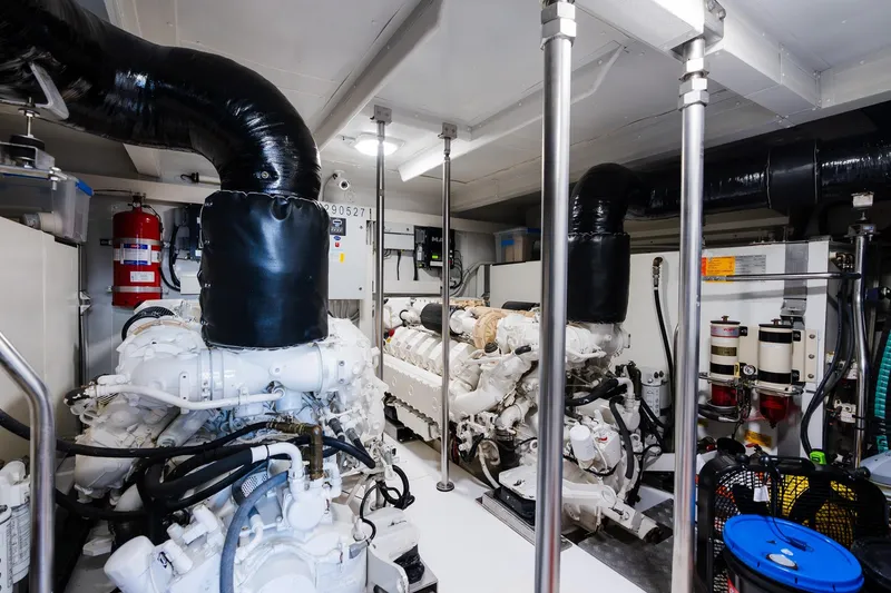 Slide: The Image of Engine room of a 2017 Azimut Fly 72 yacht, featuring advanced machinery and equipment. - 88