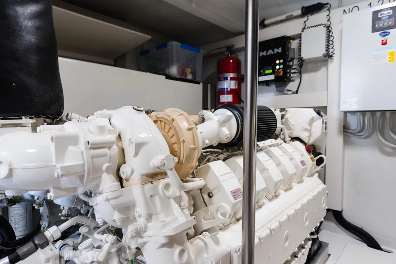 Slide: The Image of Engine room of 2017 Azimut Fly 72 yacht, featuring a powerful MAN engine. - 90