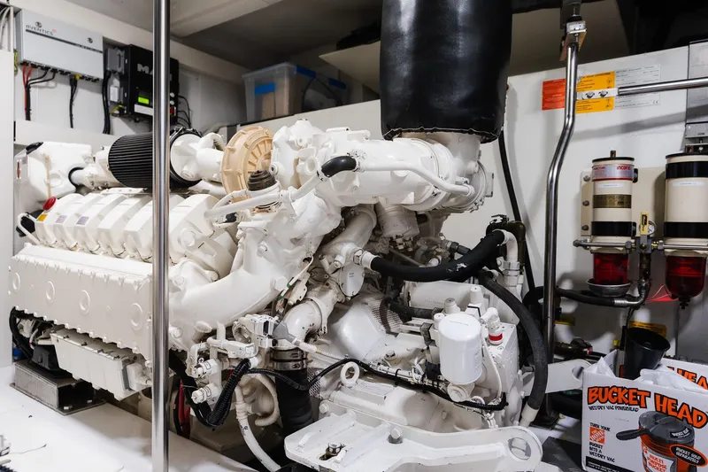 Slide: The Image of Engine room of a 2017 Azimut Fly 72 yacht, showcasing detailed machinery and components. - 93