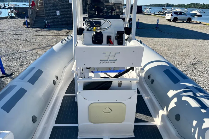 Slide: The Image of 2023 Inmar 550R-YS Yacht Series boat docked by the waterfront. - 10
