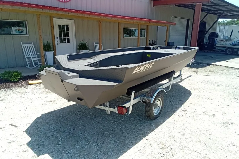 Slide: The Image of 2026 Alweld 1652 Invader boat on trailer outside a building. - 20
