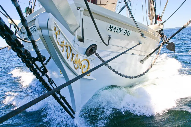 Slide: The Image of Classic 1962 Coasting Schooner "Mary Day" sailing through ocean waves. - 3