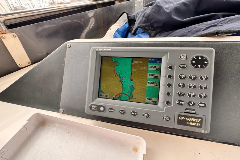 Slide: The Image of Boat navigation system with GPS display, showing a coastal map and control buttons. - 27