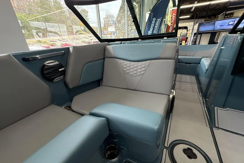 Slide: The Image of Interior of 2026 MasterCraft NXT22 boat with modern seating and sleek design. - 13