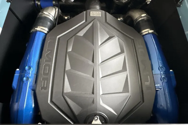 Slide: The Image of 2026 MasterCraft NXT22 engine with Ilmor branding, featuring blue components. - 16