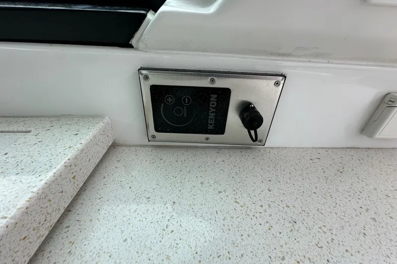 Slide: The Image of Control panel on 2018 Monterey 360 Sport Coupe boat, featuring Kenyon interface. - 6