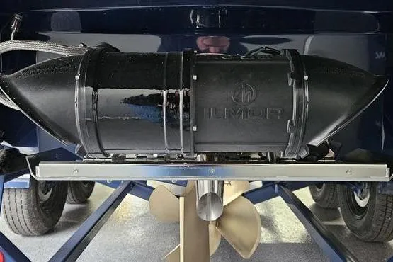 Slide: The Image of 2026 MasterCraft XT24 boat with Helmut exhaust system and propeller detail. - 19