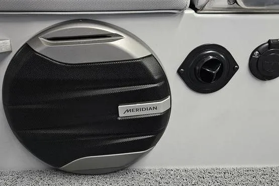 Slide: The Image of 2026 MasterCraft XT24 boat interior with Meridian speaker and control panel. - 21