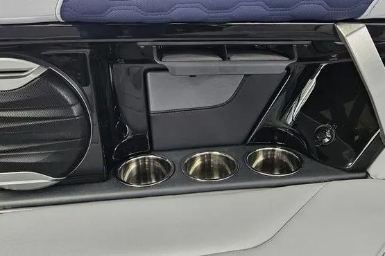 Slide: The Image of Interior of 2026 MasterCraft XT24 boat with cup holders and speaker system. - 6