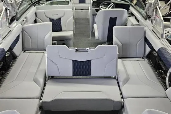 Slide: The Image of Interior of 2026 MasterCraft XT24 boat with luxurious seating and modern design. - 8