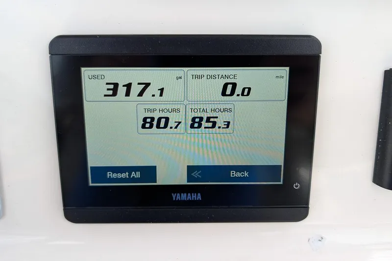Slide: The Image of Yamaha display showing fuel usage and trip hours on 2024 Key West 239 FS boat. - 14