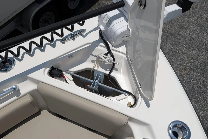 Slide: The Image of 2024 Key West 239 FS boat anchor storage compartment with open hatch. - 22