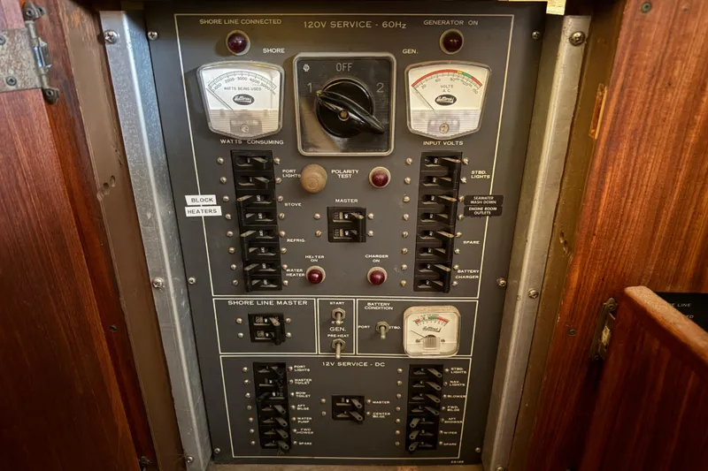 Slide: The Image of Electrical control panel on a 1979 Hatteras 46 Convertible boat. - 37