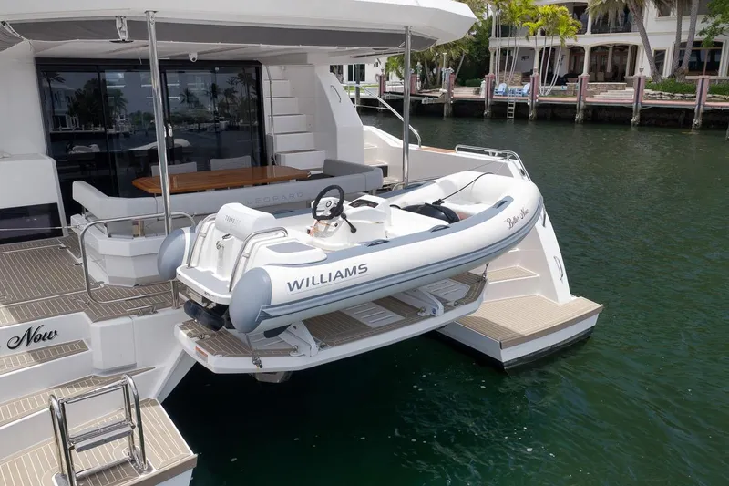 Slide: The Image of 2024 Leopard 46 Powercat with Williams tender docked at marina. - 15