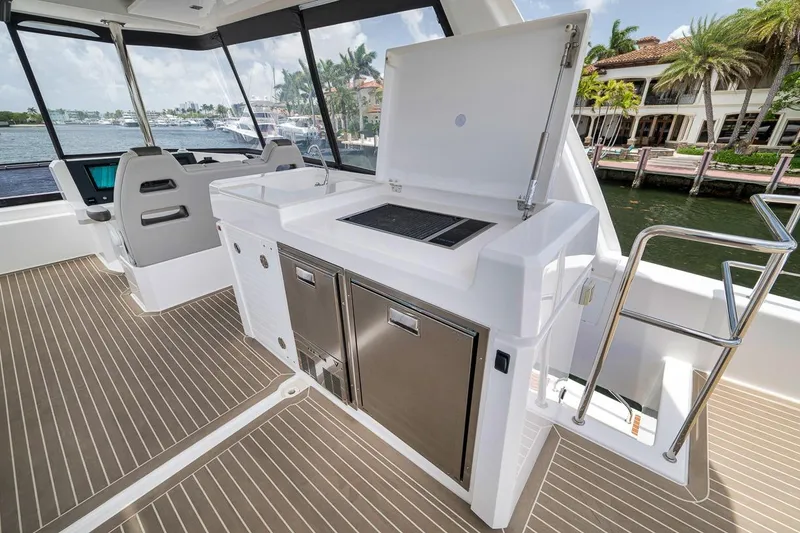 Slide: The Image of 2024 Leopard 46 Powercat yacht interior with modern kitchen and sleek design. - 37